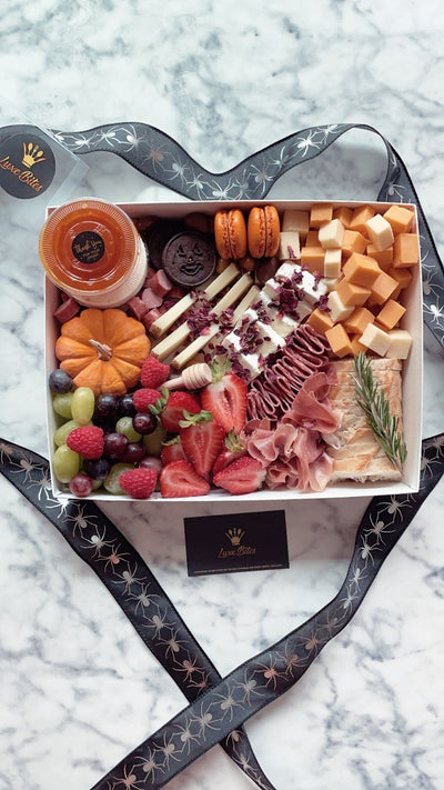 Spooky season is here… and so are our Halloween Charcuterie Boxes!
