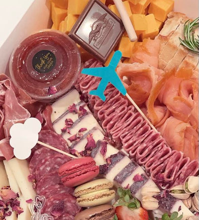 Fancy a fresh mix of fruits, cheeses and meats on the flight